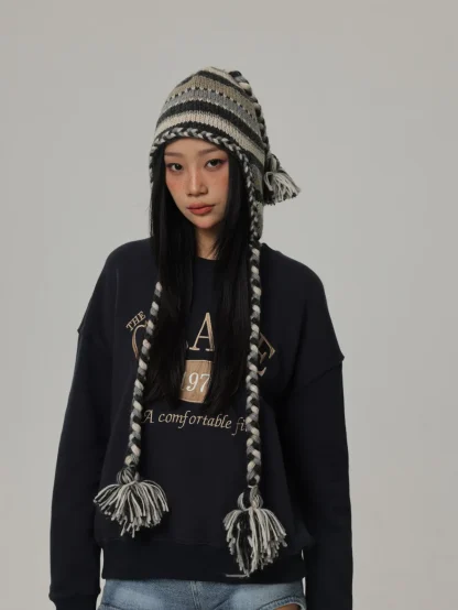 Stylish Knitted Trapper Hat with Striped Pattern - Image 4